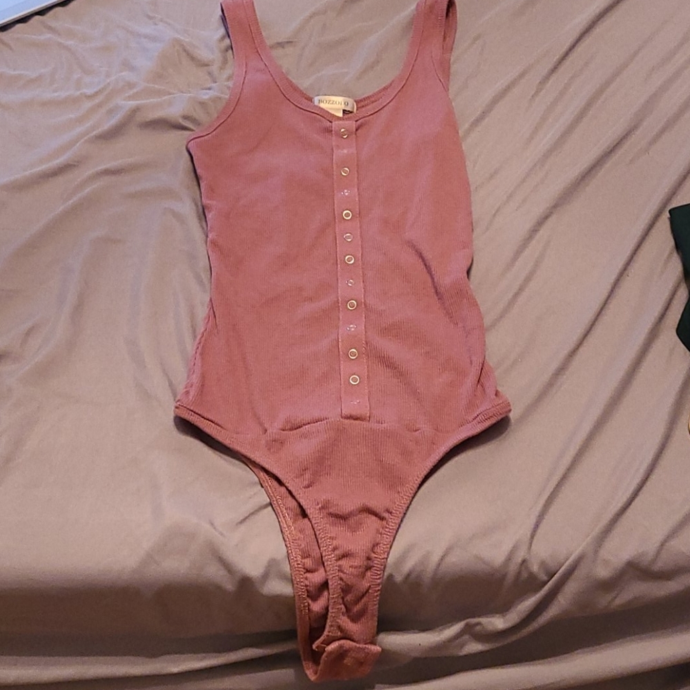 Pink body suit